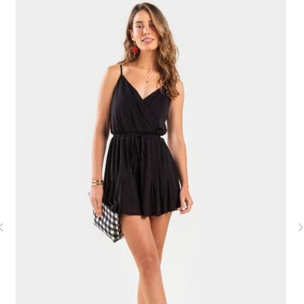 Francesca’s black Mallorie Godet romper